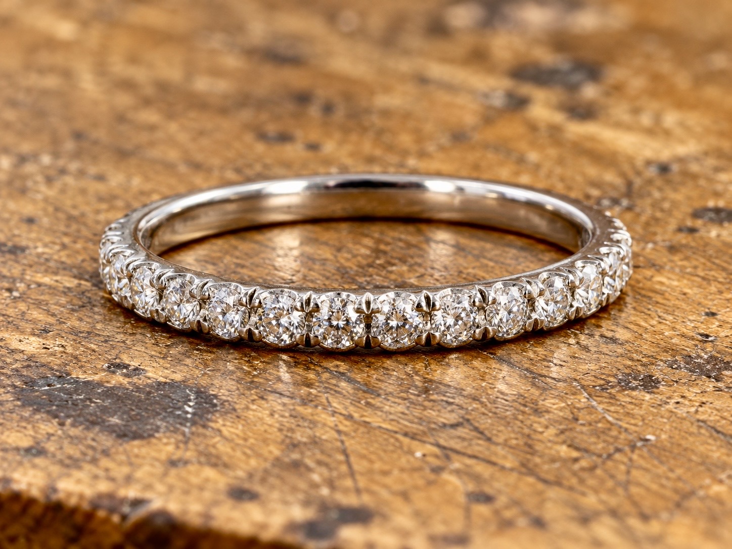 Castle set diamond eternity ring